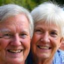 Portrait of happy clients John and Mary Smith